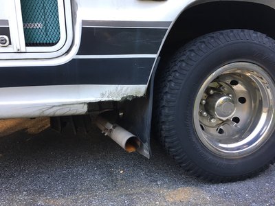 passenger-rear-wheelwell_tire-blowout-damage.jpg