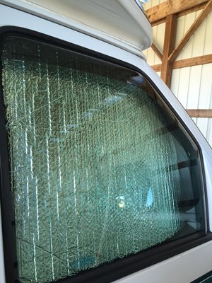 No tape, It fits in the window groove.
